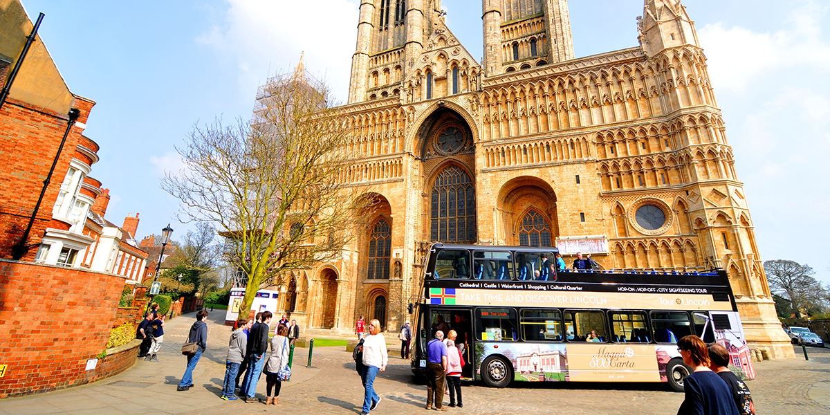 Hop on or off a Lincoln city sightseeing bus