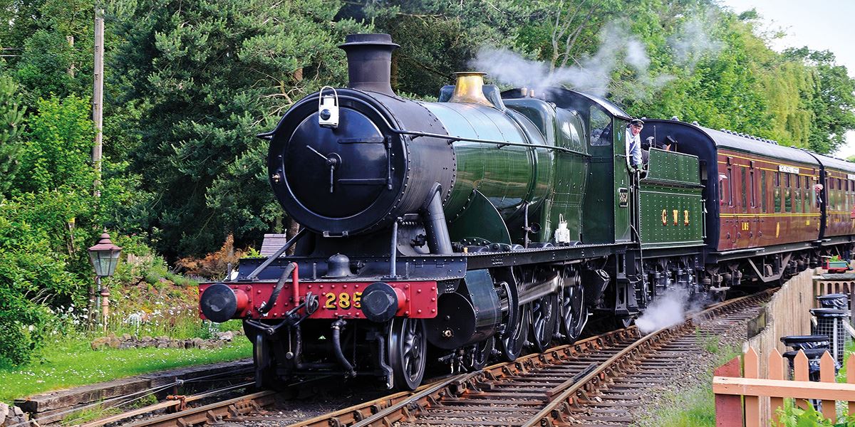 Steam train arriving at Hampton Loade railway station