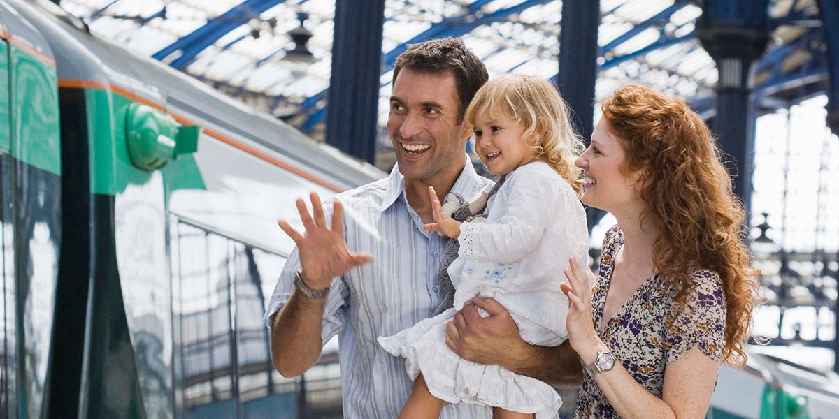 Family at train station Travel to and around Lancashire