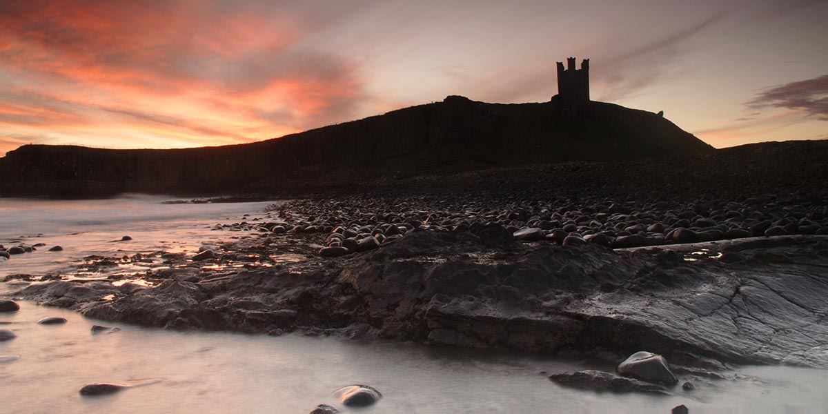 Dunstanburgh Castle, Northumberland at sunrise