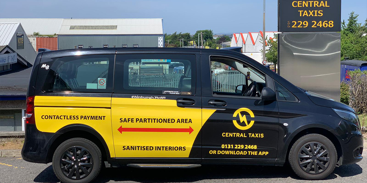 Central Taxis vehicle showing Covid-safe statements 