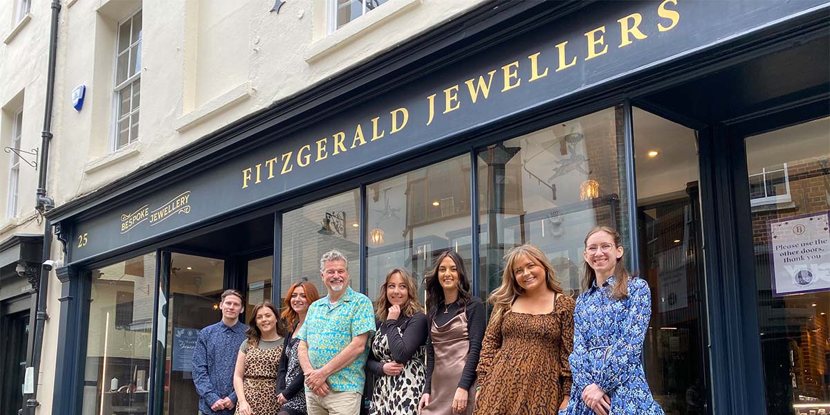 The team at Fitzgerald Jewellers stand outside their shop in Canterbury, Kent