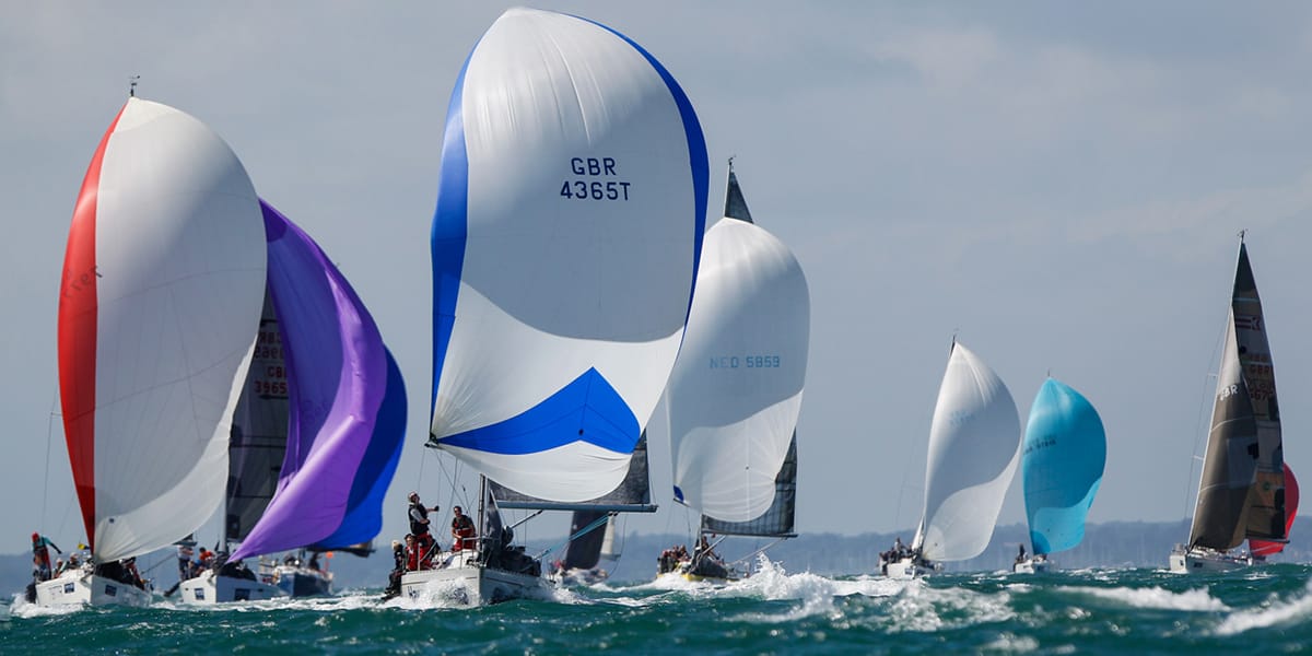 Sailors racing at the Cowes Week event